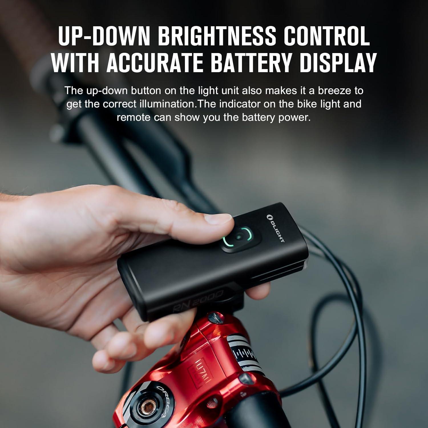 imageOLIGHT RN 2000 LED Rechargeable Bike Light 2000 Lumens and 557ft Max Throw Waterproof Bicycle Headlight with SpotampampFlood Beams Remote Control TypeC and Smart Sensor for Mountain and Urban Riding