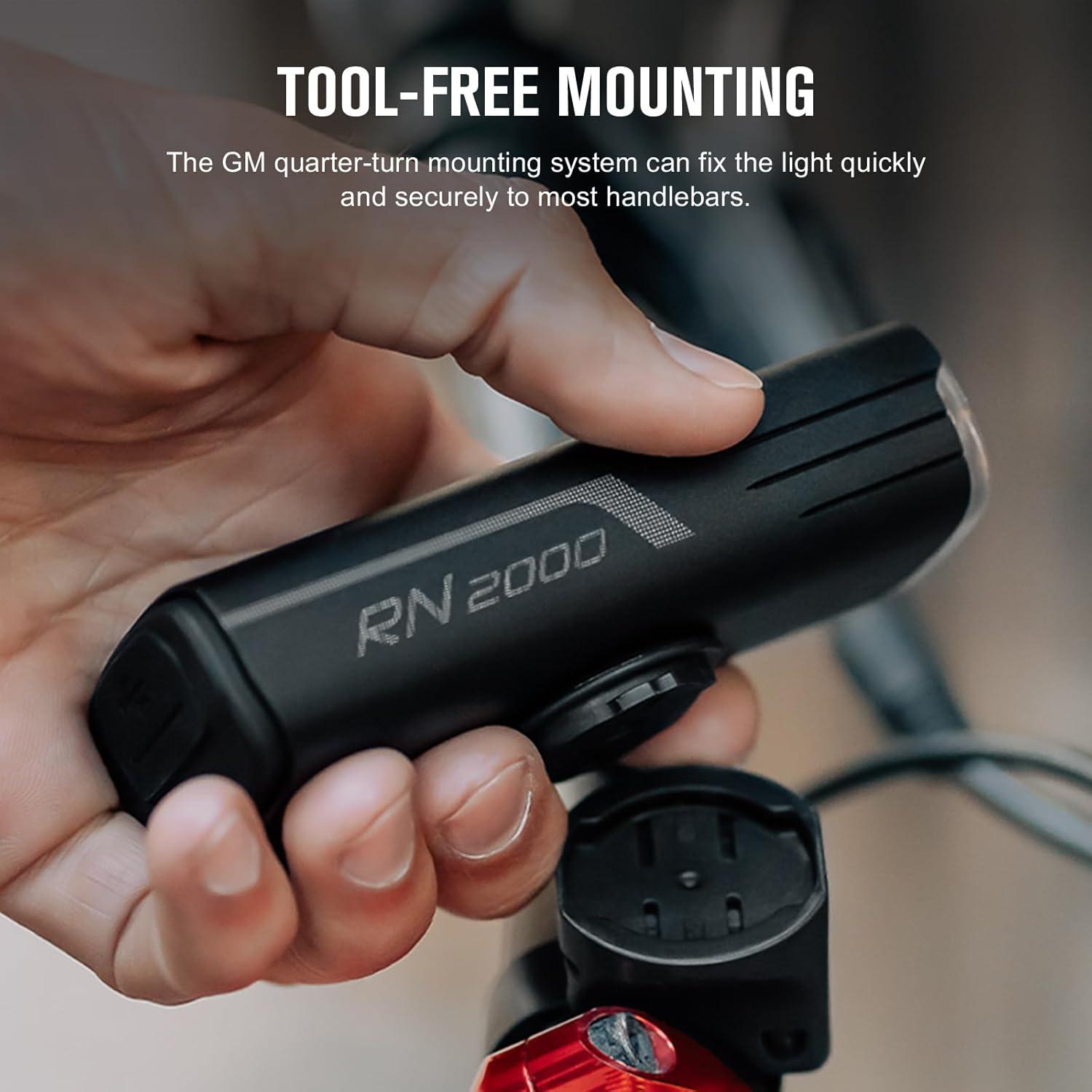 imageOLIGHT RN 2000 LED Rechargeable Bike Light 2000 Lumens and 557ft Max Throw Waterproof Bicycle Headlight with SpotampampFlood Beams Remote Control TypeC and Smart Sensor for Mountain and Urban Riding