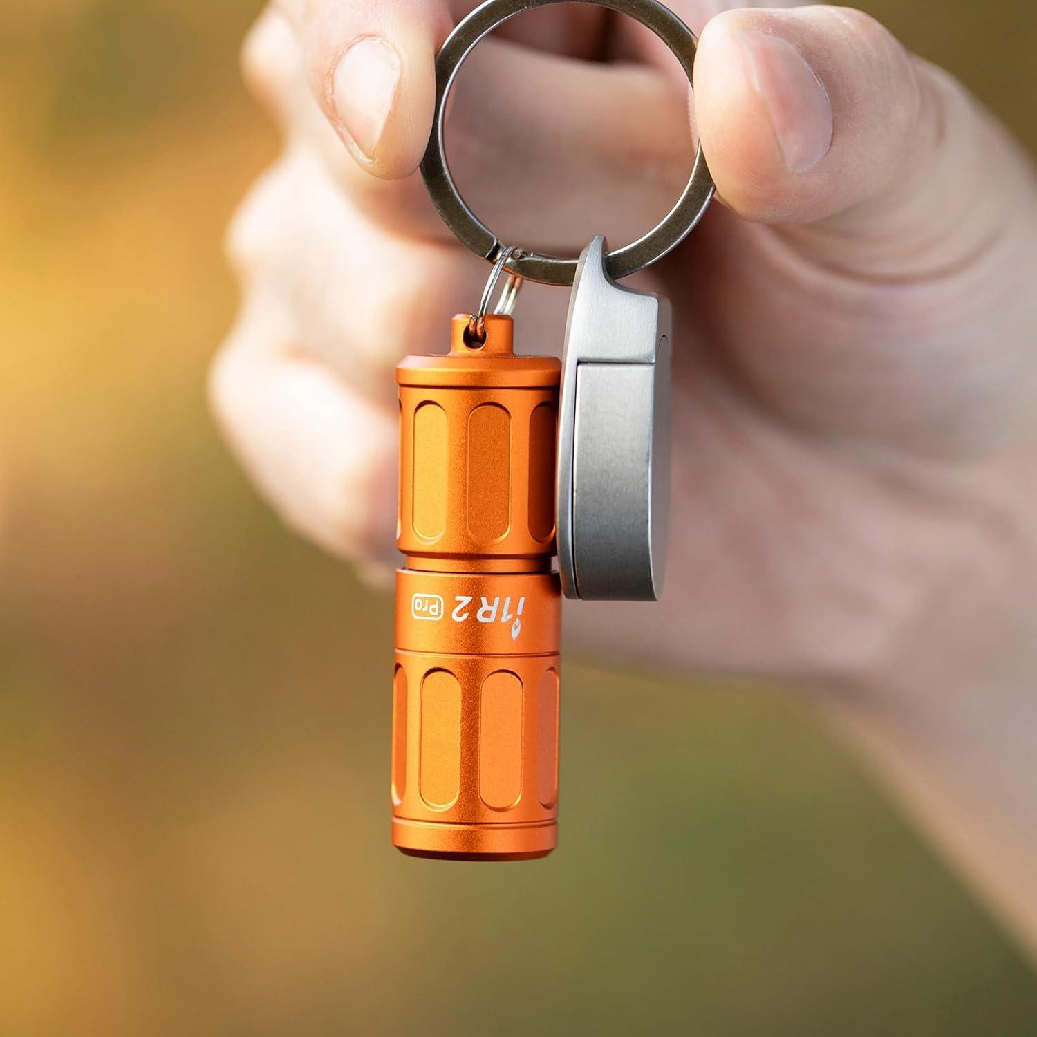 imageOLIGHT I1R 2 Pro Eos 180 Lumens EDC Rechargeable Keychain Flashlight Powered by Builtin Rechargeable Battery with TypeC USB Cable Slim Mini Handheld Light for Everyday Carry BlackOrange